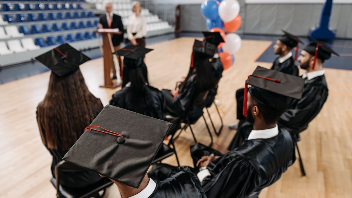 Graduates throwing their caps at a graduation ceremony