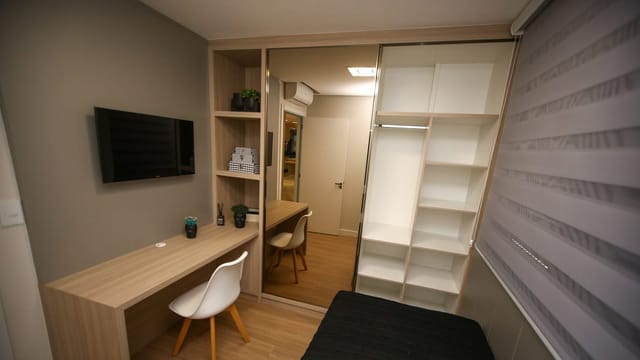 Small student studio with a desk