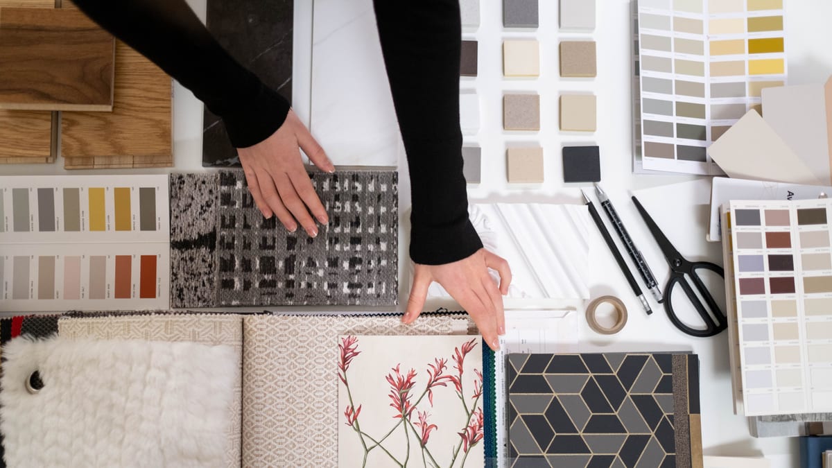Interior designer working on a materials board