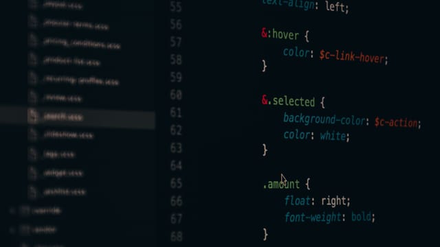 Developer working on code at a screen