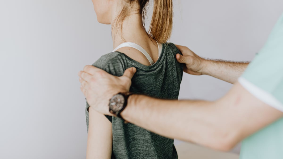 Osteopath treating a patient