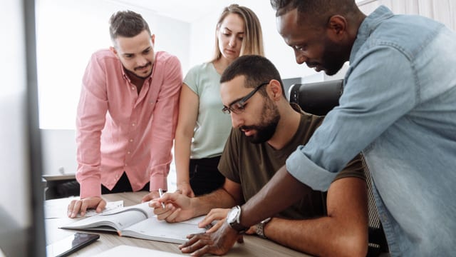 Young professionals from various careers at work