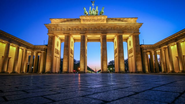 The Brandenburg Gate lit up at dusk, Berlin